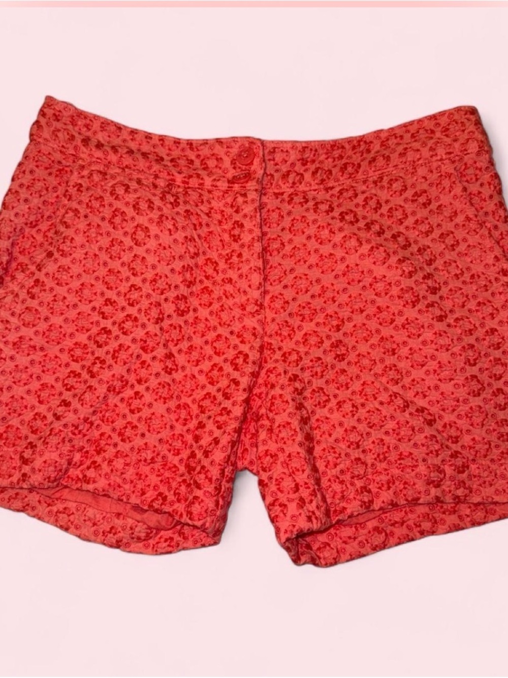 coral-pink Tommy Bahama eyelet cotton shorts